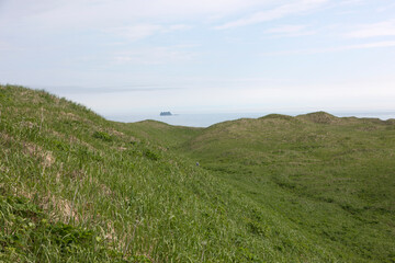 Fototapeta premium Russia Commander Islands landscape on a cloudy summer day