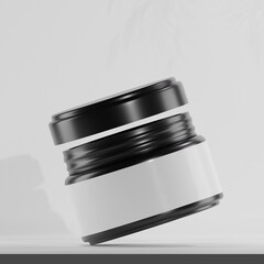 A sleek black cosmetic jar lies on its side, lid ajar, against a minimalist white backdrop. The blank label provides ample space for branding and product information, making it ideal for showcasing .