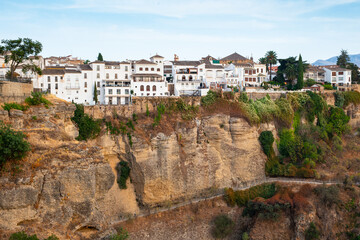 Houses built on the edge of the cliff in the ancient city of Ronda, andalucia, Spain