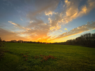 Obraz premium New England Sunset over Field