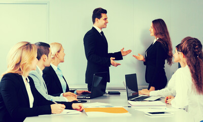 Gathering of students around a large table
