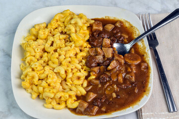 beef stew  with  macaroni and cheese