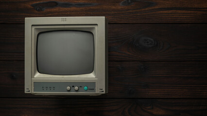 Vintage Retro Television on Wooden Wall Background for Nostalgic Media Themes