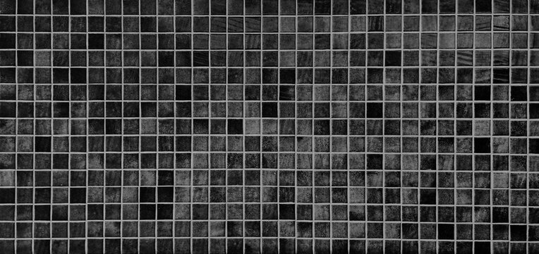 black ceramic mosaic tile background. trendy vintage ceramic tiles to decorate the interior wall or floor. multi grey color tone of ceramic tiles. furnishing material for interior decoration.