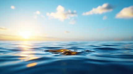 Calm Ocean Waves Under Radiant Sunrise Sky