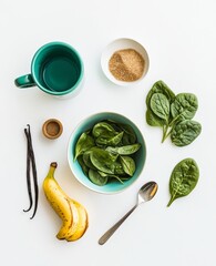 Obraz premium A vibrant assortment of fresh ingredients with spinach, a banana, and vanilla pods arranged creatively for a healthy recipe