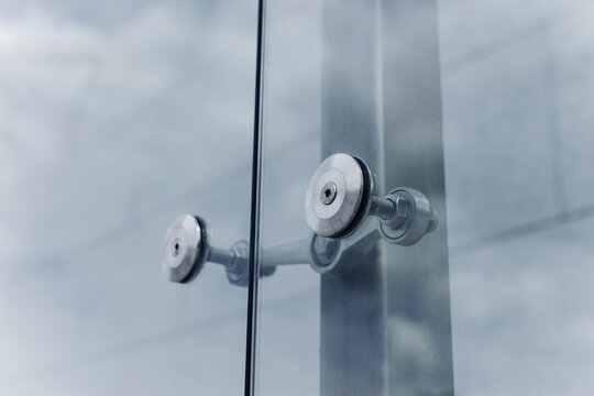 Spider facade fixing system. Elements of fastening of the facade. Facade detail. Elements of the glass facade