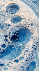 Close-up of soap bubbles in blue