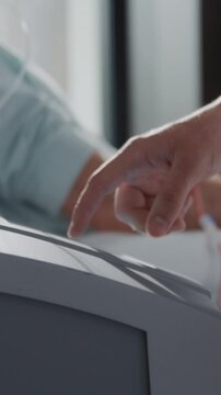 Close up hands female nurse use machine for blood. Man donates blood. Medicine. In hospital room. Healthcare. Slow m otion