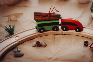 a toy wooden train rides on a wooden road a winter's tale