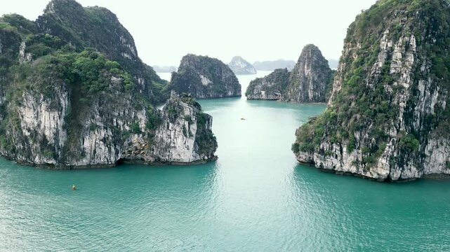 Ha Long Bay & Bai Tu Long Bay - Aerial Drone View - Vietnam Tourism. Epic Video of the water and limestone rocks in this National Park