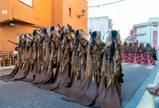 People performing in a Moros y Cristianos parade, traditional celebration in Spain.