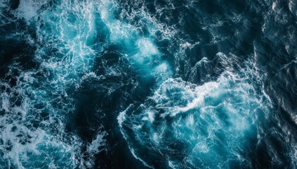 Fototapeta premium The ocean's waves surge and crash, creating dynamic patterns of foam against the deep blue backdrop at dusk, capturing nature's power