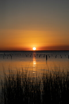 Intense orange sunset on Lake George, part of the St Johns River in Florida