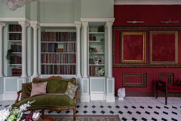 the chic expensive interior of the living room in the historical Baroque style, tiles on the floor, walls decorated with wood. the furniture is in a historical style.
