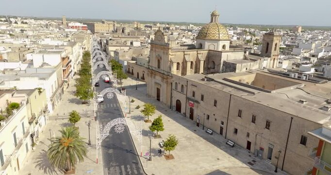 Aerial view of the Church of Santa Maria di Costantinopoli located in Manduria, in the province of Taranto, Italy. It is located in the main street of the city. It has a neoclassical facade.