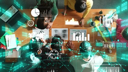 Top view of skilled business team put graphic logo on meeting table with colorful sticky notes and start to design while explain idea. Smart project manager explain about financial graph. Symposium.