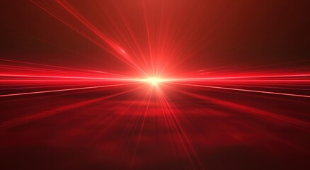 Red light is shining on a red background. The light is bright and intense, creating a sense of energy and excitement