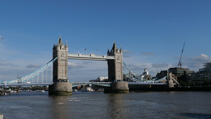 View of Tower Bridge in London, spanning the River Thames. Showcasing the iconic bridge's stunning...