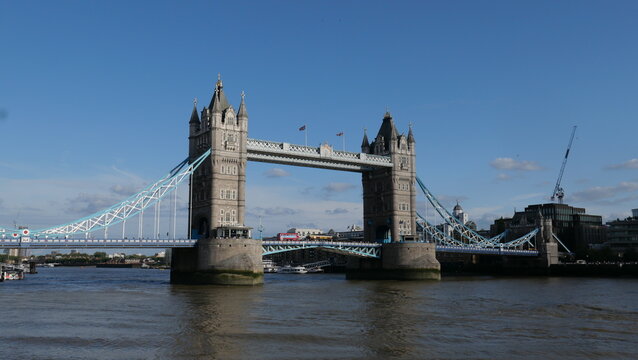View of Tower Bridge in London, spanning the River Thames. Showcasing the iconic bridge's stunning Gothic architecture and its prominent role in the city's skyline.