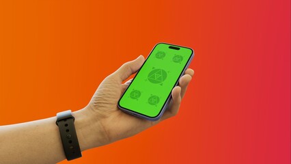 Caucasian White middle aged male using smartphone with a blank green screen. Mobile app mockup. Vertical phone orientation