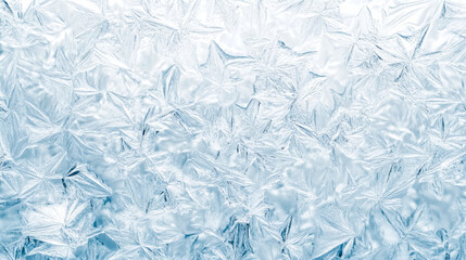 Obraz premium Beautiful ice crystals forming intricate pattern on window during winter