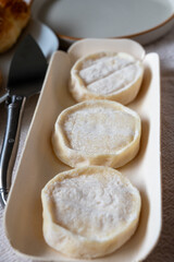 Rocamadour or cabecous soft goat AOC cheese with soft rind produced on farm in Perigord and Quercy on farmers market, departement Lot, France