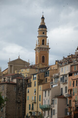 Fototapeta premium View on French Riviera, colorful Menton old city and marina on blue Mediterranean Sea near French-Italian border, travel destination, panoramic view from above