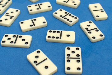 Dominoes bones on blue background	