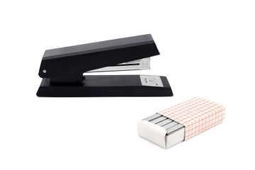 black stapler and steel paper scrapers