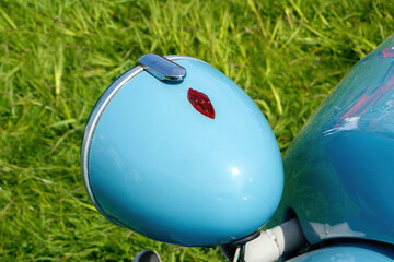 close up of vintage blue Citroen 2cv headlamp
