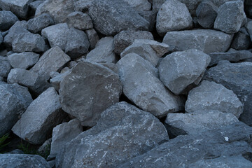 Processed collage of sea shore pebbles texture. Background for banner, backdrop or texture for 3D mapping stone