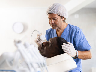 With skin scrubber device, cosmetologist effectively removed dead skin cells, leaving client's face...