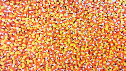Photo of candy corn Halloween candies laying flat