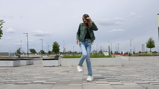 Shuffle dancer - young blonde woman dancing on the street