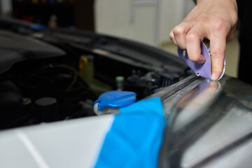 Applying a Protective Film on Your Cars Headlight for Enhanced Longevity and Safety