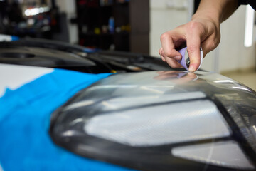 Applying a Protective Film on Your Cars Headlight for Enhanced Longevity and Safety