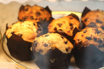 Muffins on plate in cafe for sale