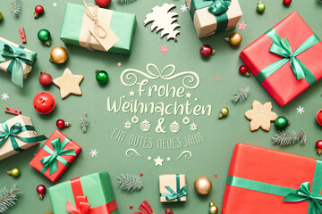 Frame made of Christmas decor, gifts and cookies on green background