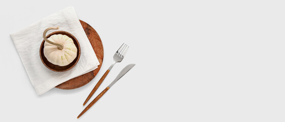 Autumn table setting with pumpkin on white background