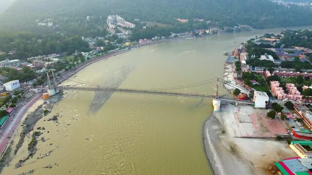  Aerial view of Janki setu bridge across the river ganga, city of rishikesh in the Indian state of uttarakhand India