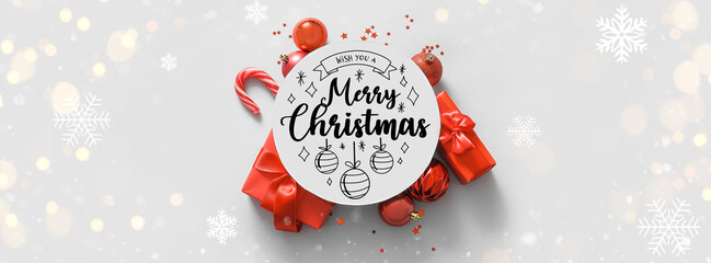 Round blank card with red Christmas decor on white background
