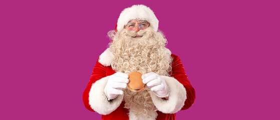 Santa Claus with tasty burger on purple background