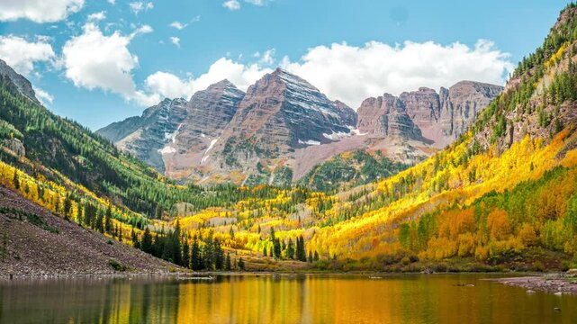 Sunny lake in the mountain during fall season, timelapse, Maroon Bells, Colorado, 4K