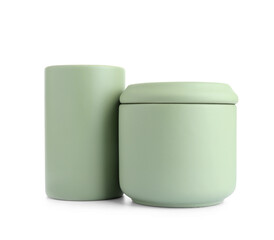 Jars for bathroom accessories on white background