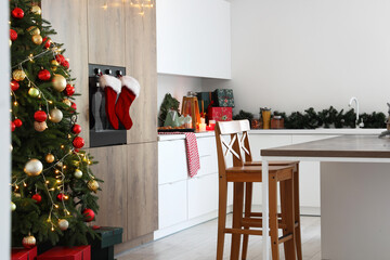 Interior of light kitchen with Christmas decor