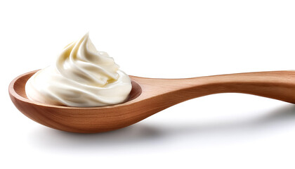 Wooden spoon filled with buttercream on white background