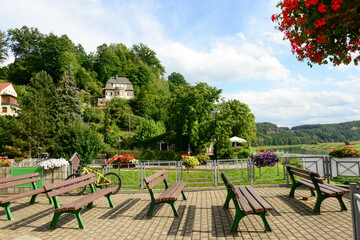 Obraz premium View of park with benches in village