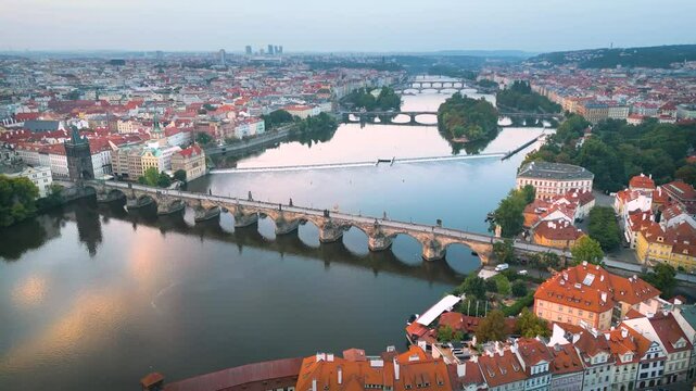 Aerial:Prague scenic spring aerial view of the Prague Old Town pier architecture and Charles Bridge over Vltava river in Prague, Czechia. Old Town of Prague, Czech Republic.