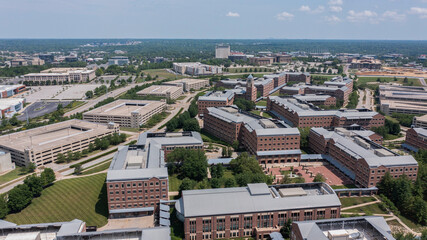 Overland Park, Kansas, USA - June 17, 2023: Morning light shines on the buildings of the downtown city skyline.